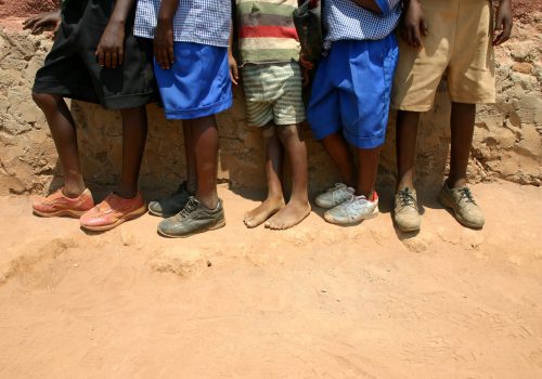 "A group of children line up at a student center in Kigali, Rwanda, Africa.  This area is highly affected by AIDS."